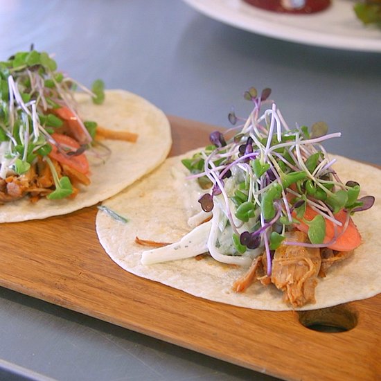 tacos with greens and sprouts on top