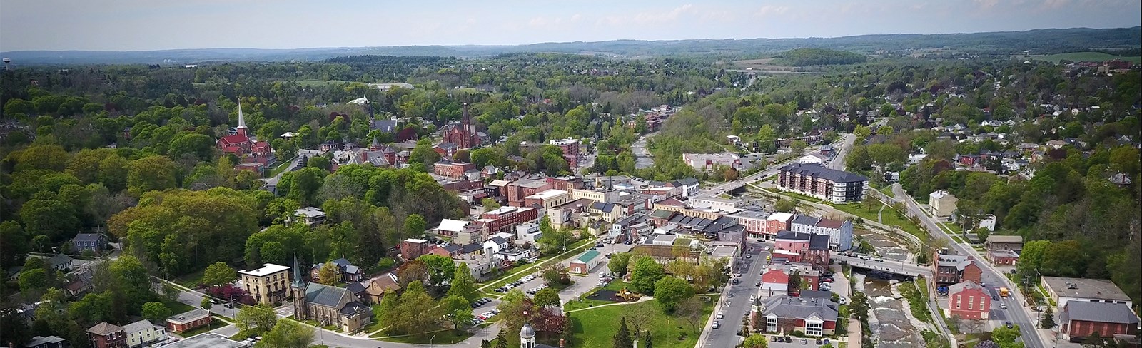 An aerial view of a small, historic downtown