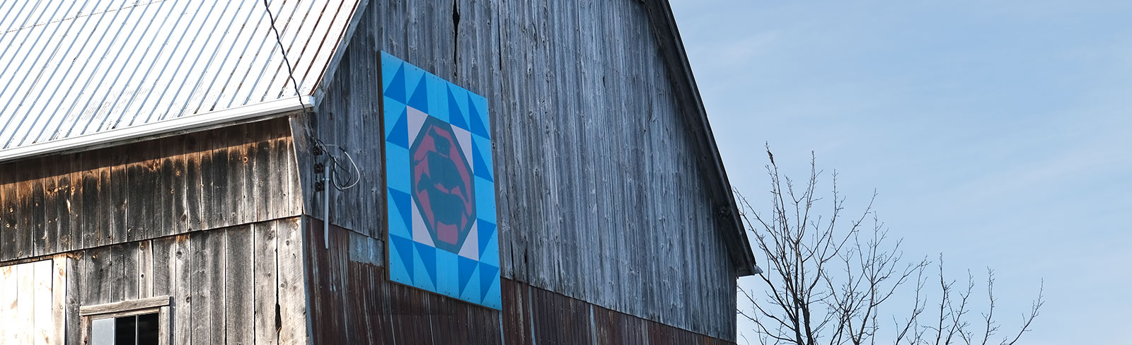 Barn quilt mounted on barn