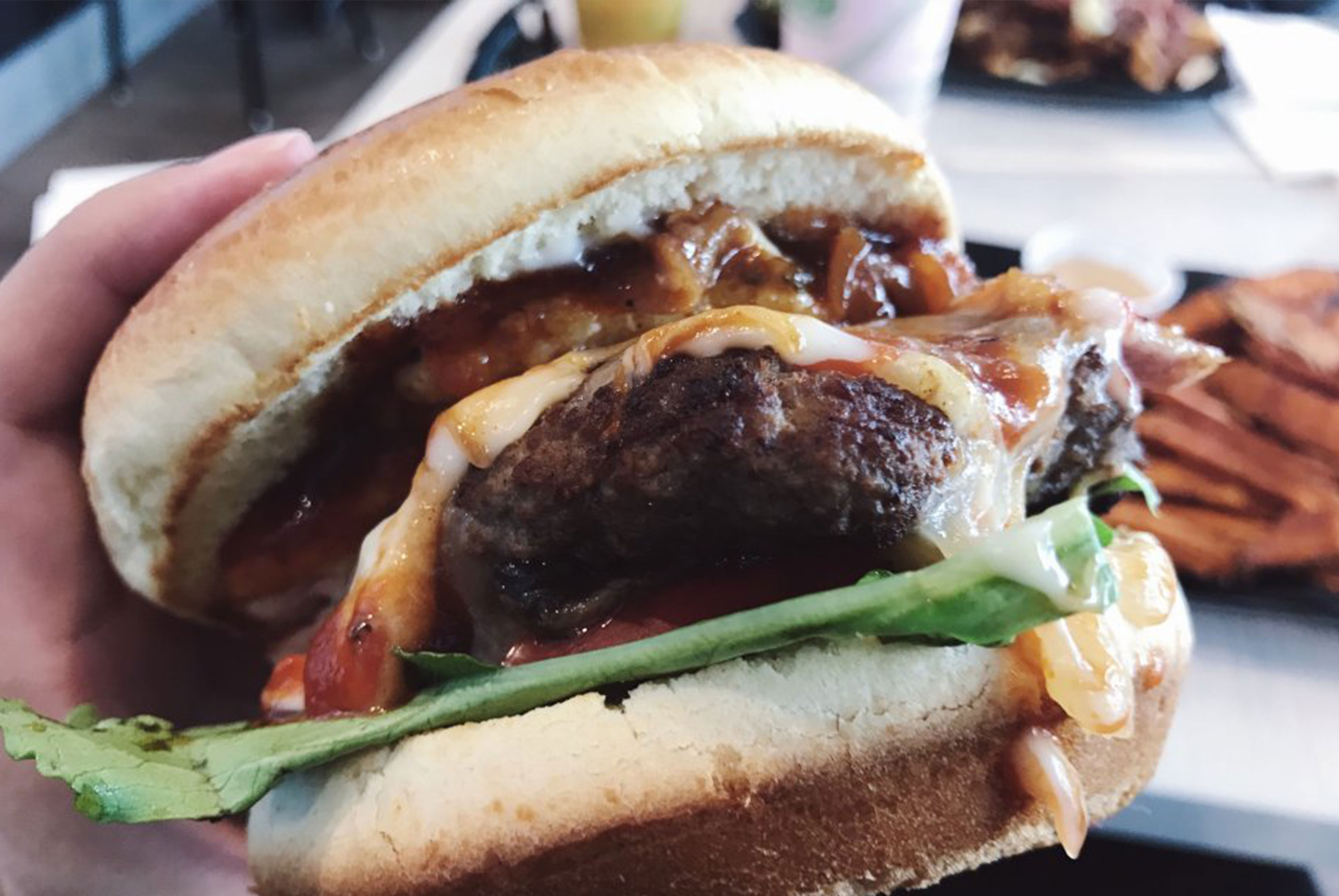 Burger in hand