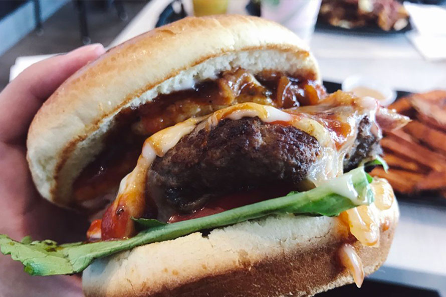 Burger in hand