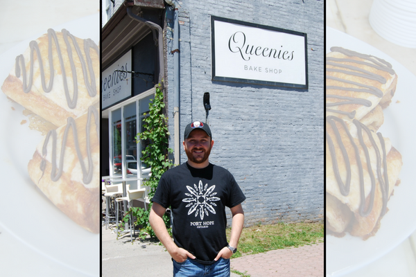 Adam the owner of Queenie's in front of the bake shop