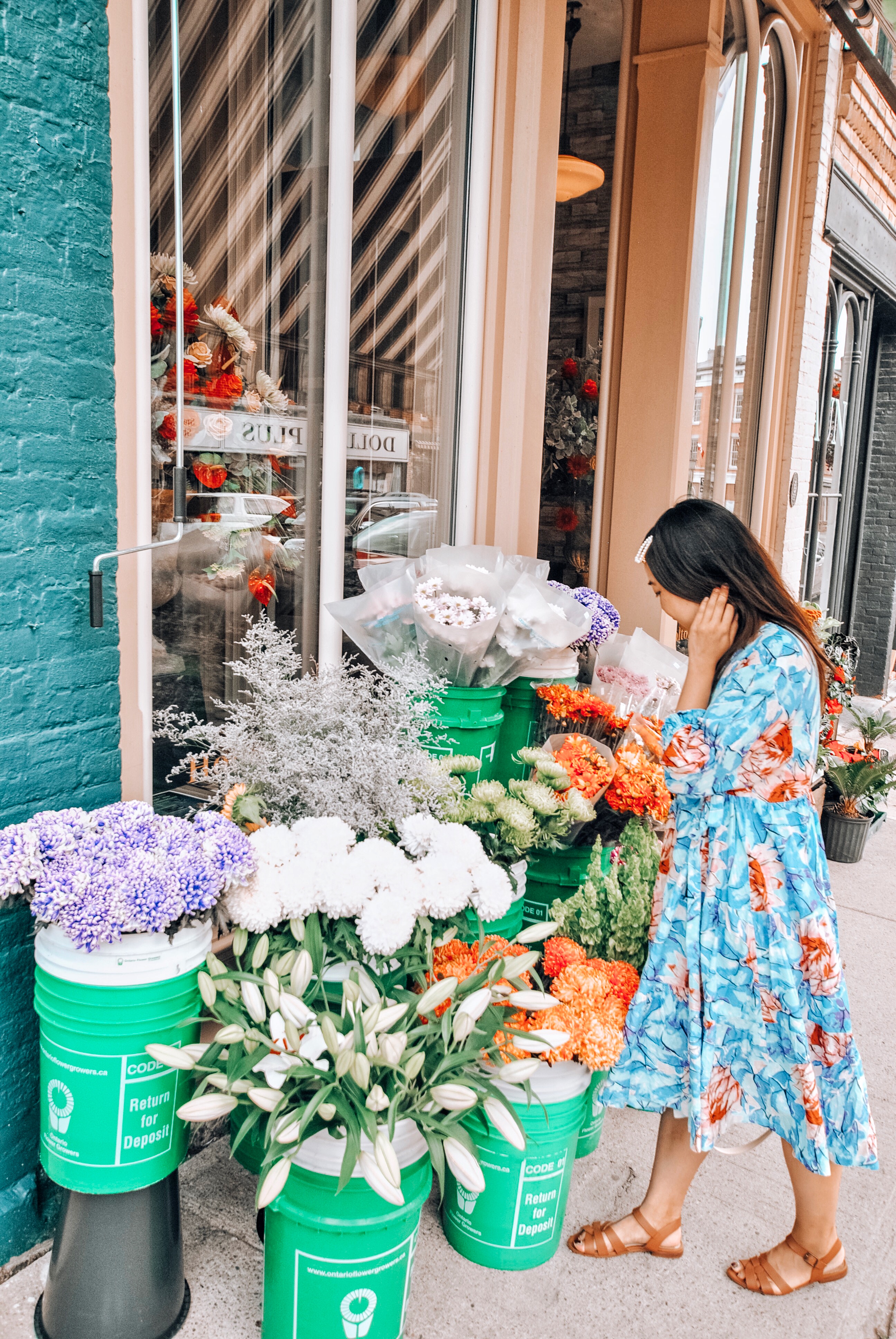 Woman shopping at Holton Flowers in Port Hope