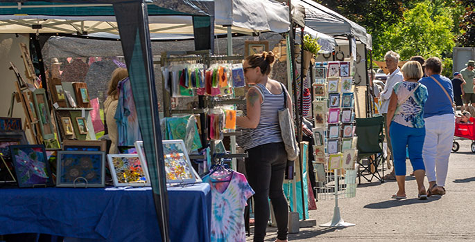Crowd shopping at Art Festival tents