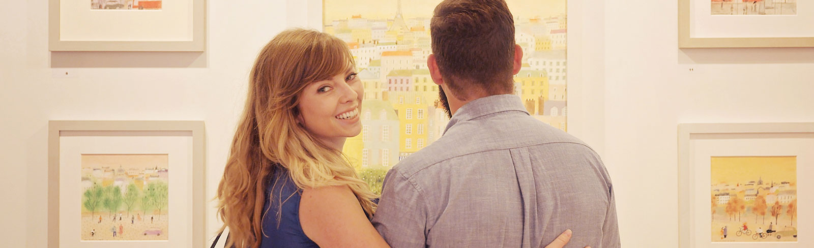 Couple admiring artwork