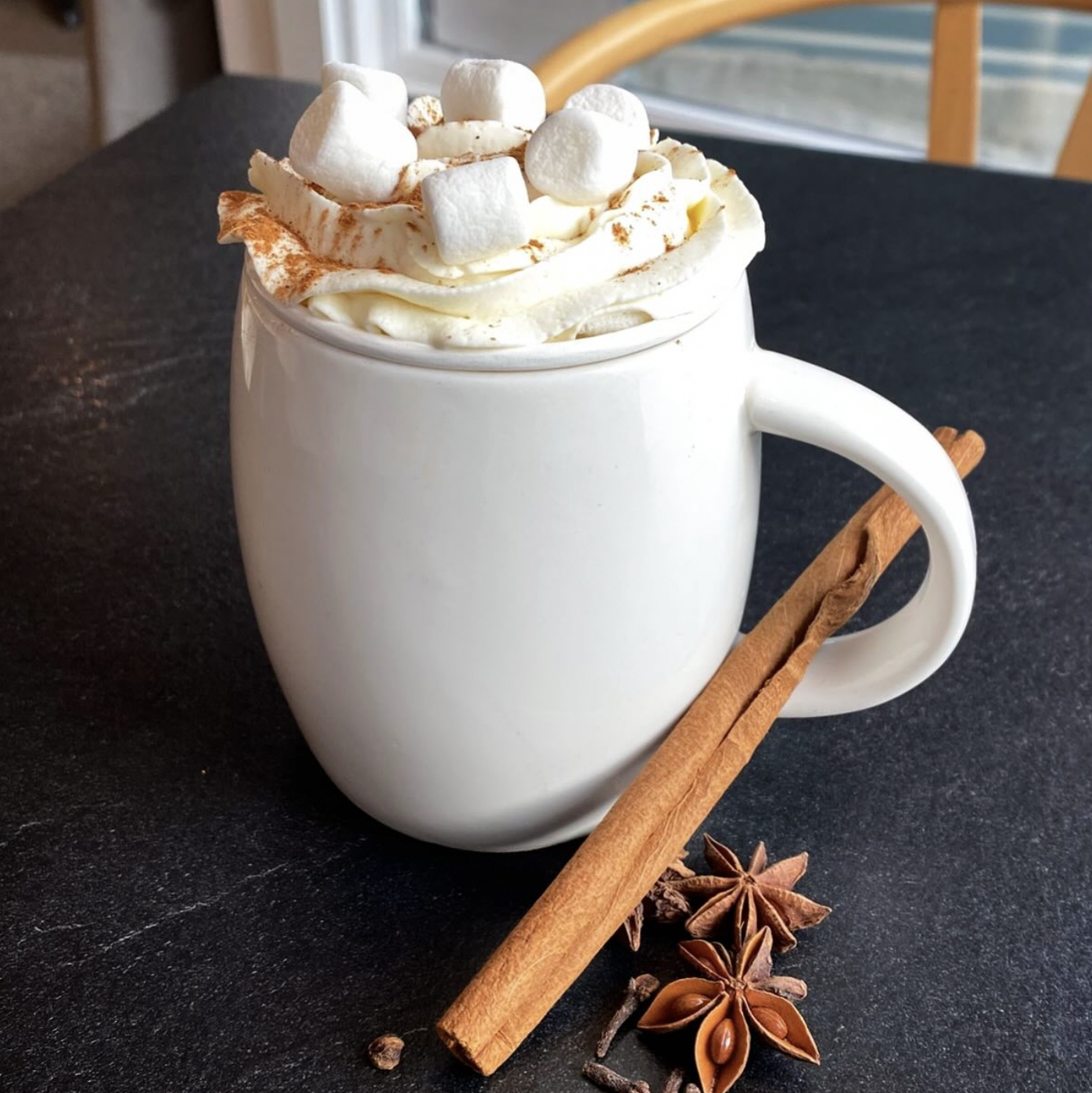 Delicious handmade syrup with fresh ginger, cinnamon, molasses, orange zest and more spices. Served with real whipped cream, cinnamon and a mini gingerbread cookie