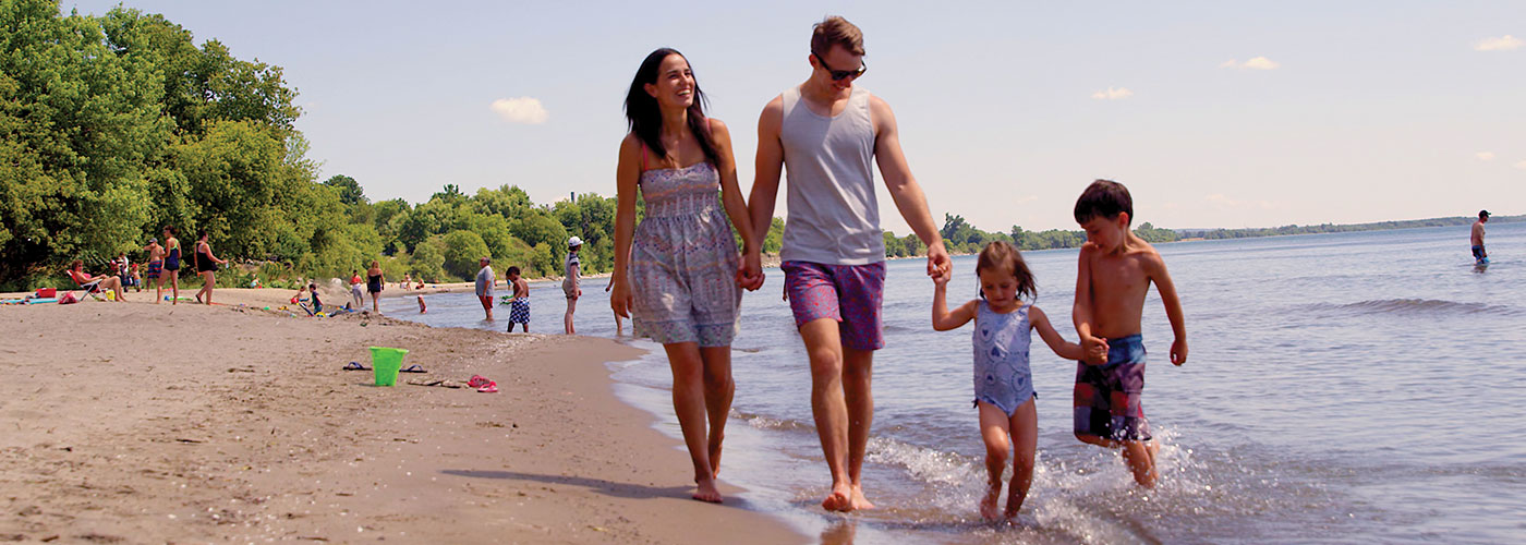 Family walking on beach