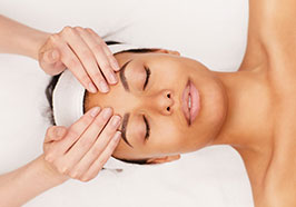 Woman receiving a facial