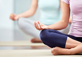 Yoga mats and people doing yoga