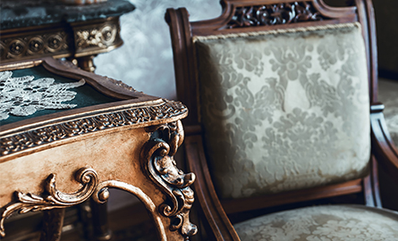 An antique table and chair