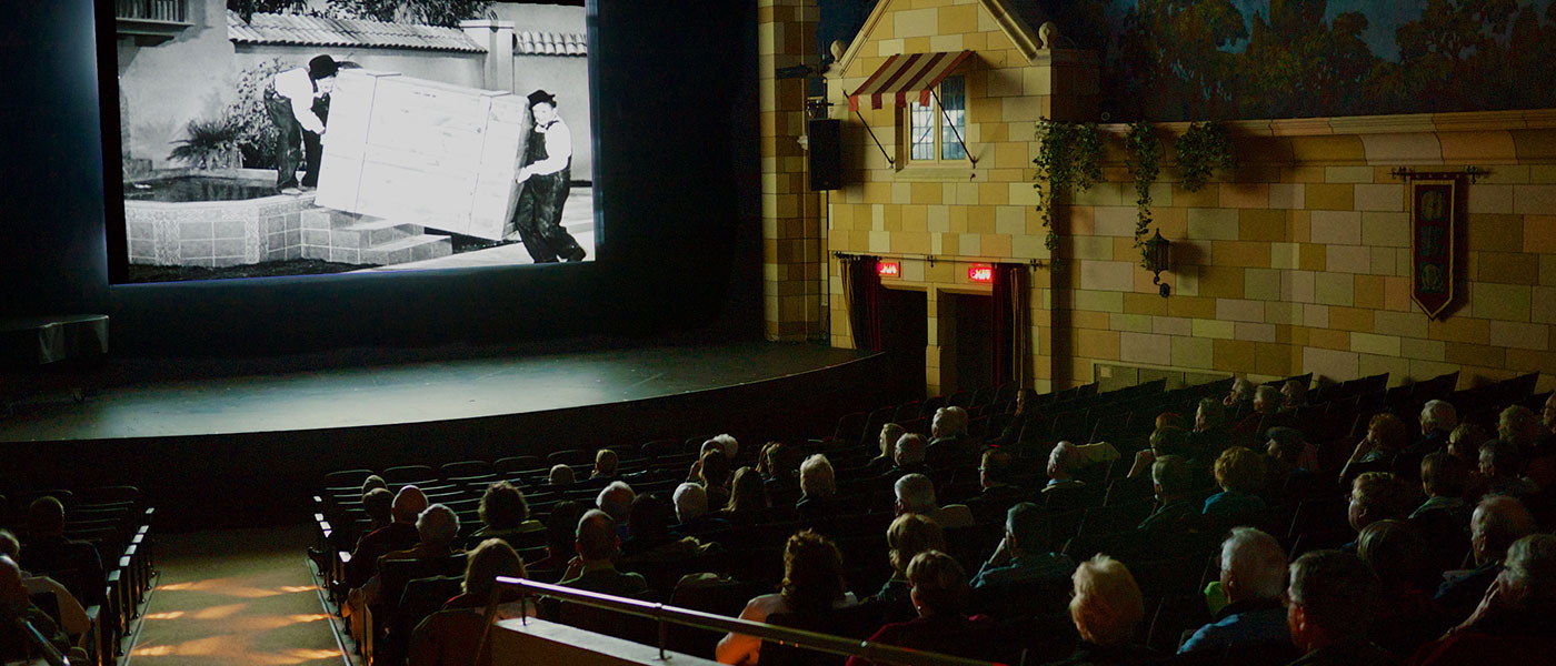 Interior of the Capitol Theatre in Port Hope with a vintage film on screen