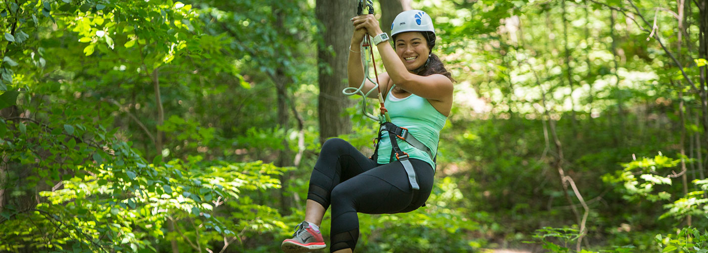 Girl treetop trekking